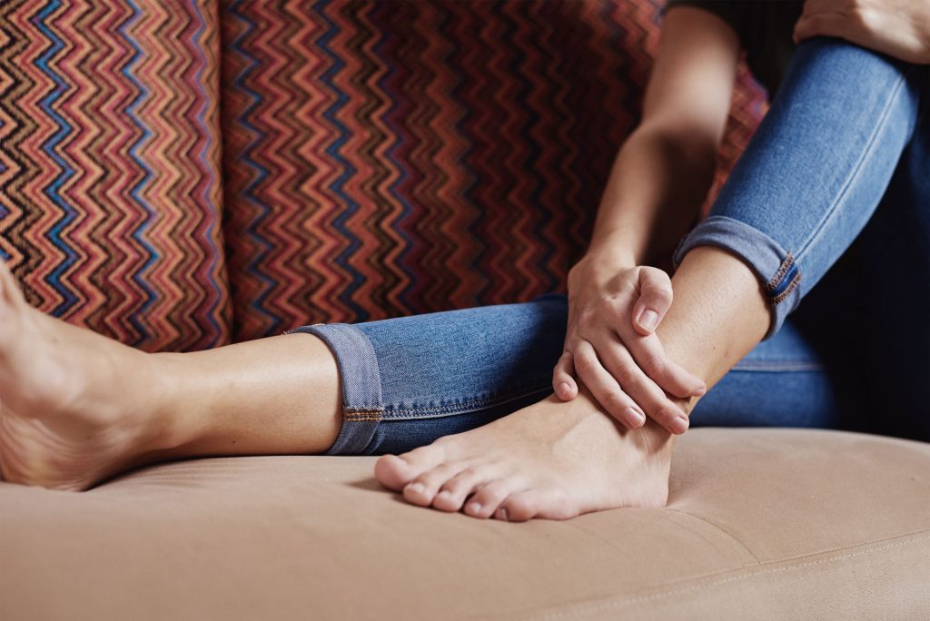 Woman with heel pain.
