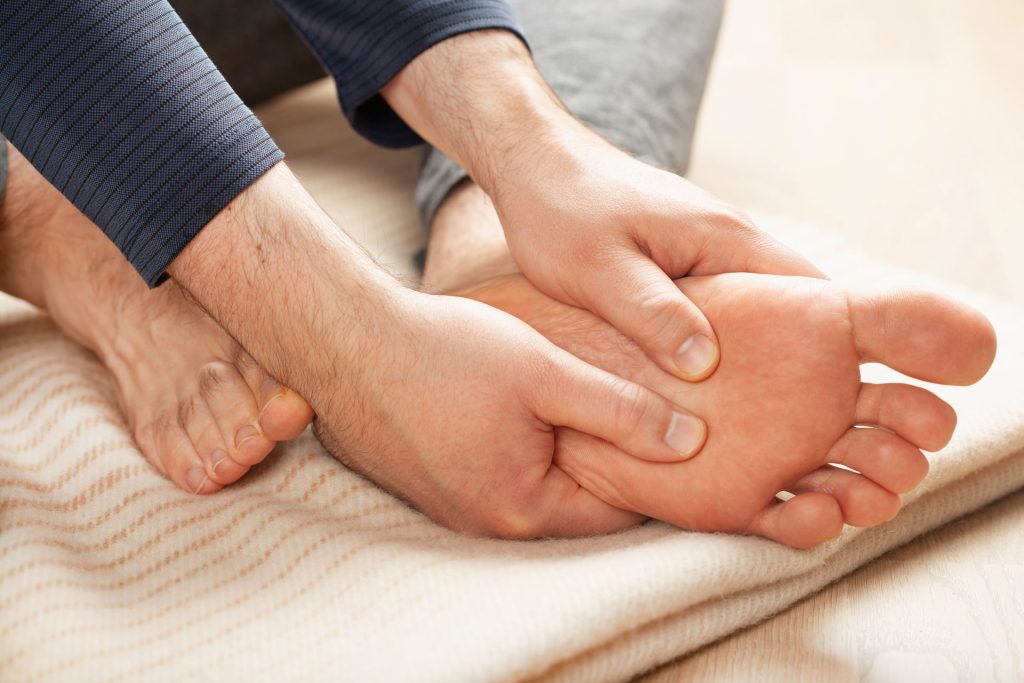 Man doing flat foot correction.