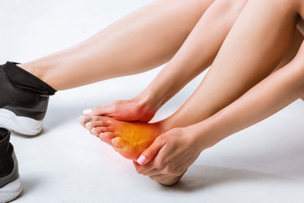 Foot of a sportswoman in pain.