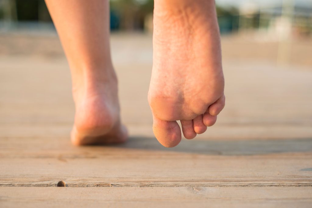 Feet close up photo.